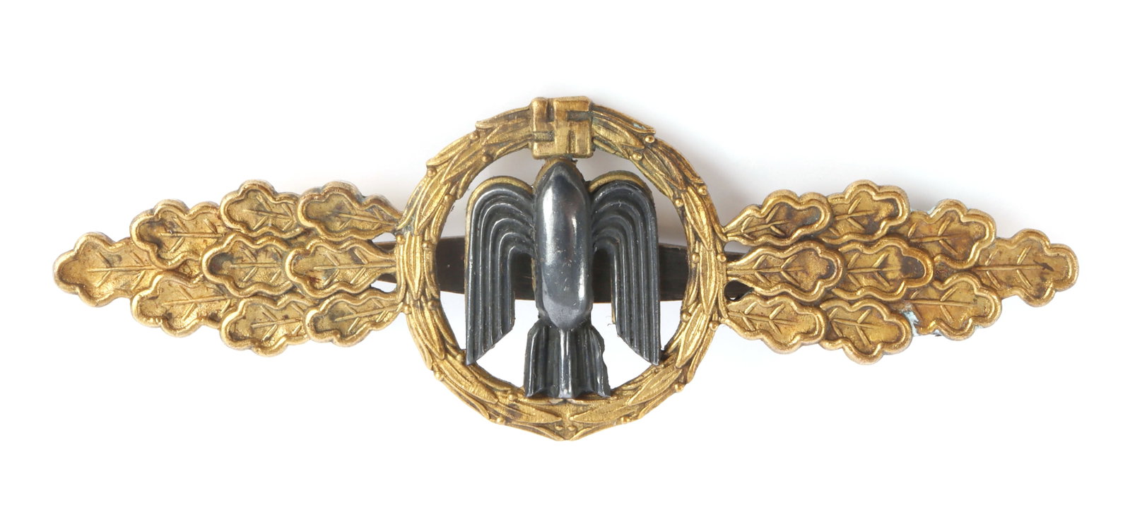 WWII GERMAN LUFTWAFFE BOMBER CLASPS: Gilt tombak constructed wreath with silvered winged bomb. Reverse is marked CE. Juncker Berlin SW68. It measures 3 inches. Very good condition.