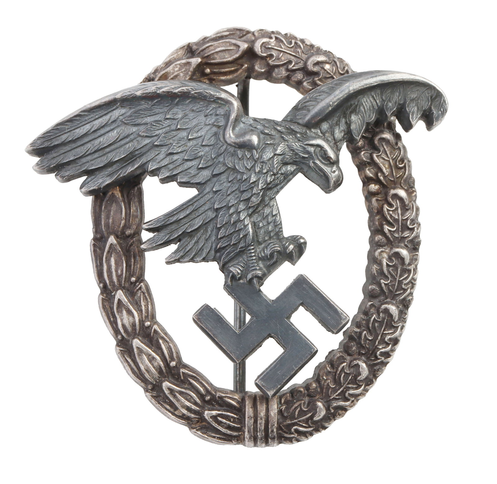 WWII GERMAN THIRD REICH LUFTWAFFE OBSERVER BADGE: A Luftwaffe observer badge for the Third Reich. Bears the Luftwaffe eagle holding a Swastika, encircled by a wreath. Juncker marked. C clasp. Very good condition.