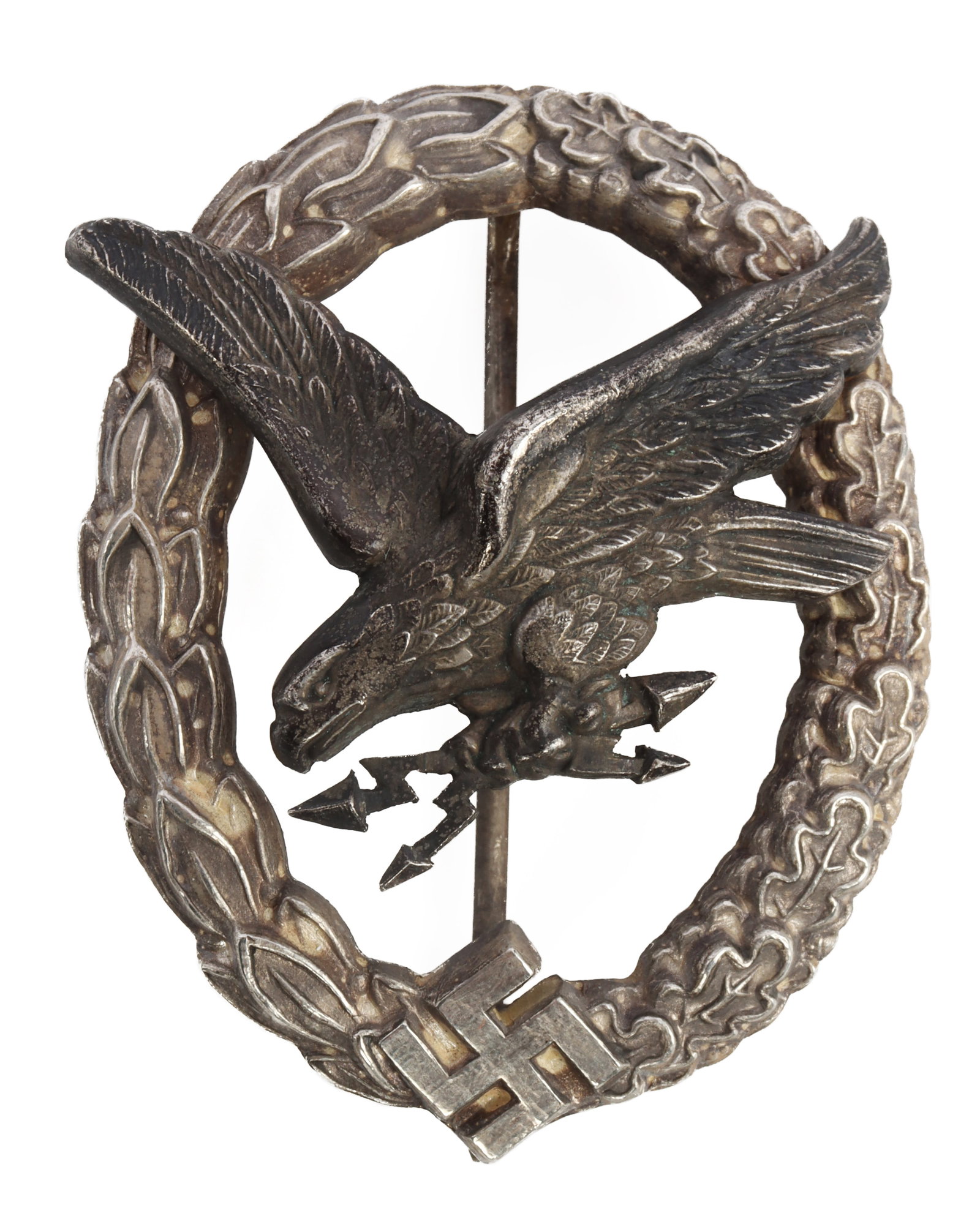 WWII LUFTWAFFE GUNNER & RADIO OPERATOR BADGE: Early type with cutout swastika on the wreath. Silvered tombac. Dual rivet with C catch. Maker marked W. Deumer in irregular upside down fashion. It measures 2 inches. Very good condition. This lot ha