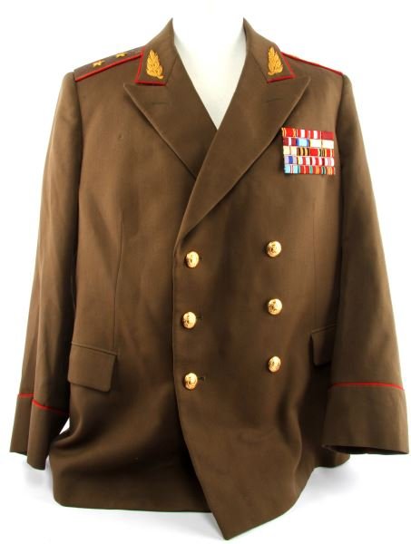ROMAINIAN TWO-STAR GENERAL'S TUNIC: Post-War Soviet two-star General's four-pocket tunic with name bar “Paraschiv,” bullion collar tabs and shoulder boards, aiguillettes and Romanian shoulder patch. Overall in very good condition.