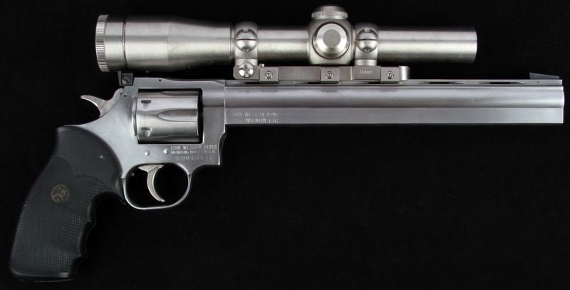 DAN WESSON MODEL 15-2 TARGET REVOLVER 10 INCH BBL: Dan Wesson Model 15-2 stainless steel .357 Magnum target revolver, with removable 10 inch barrel, and Redfield 2 1/2x stainless scope. Bore is bright and clean, finish 98%, and grips excellent. Overal