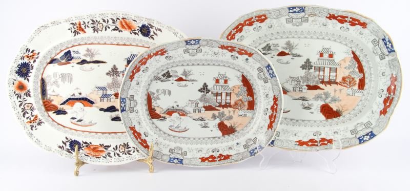 3 MASONS PATENT IRONSTONE CHINA PLATTERS: One measuring 17 by 14 inches and two measuring 20 by 16 inches. Two of the platters have the exact same Asian style theme transfer pattern with only a size difference. Both have some slight chipping 