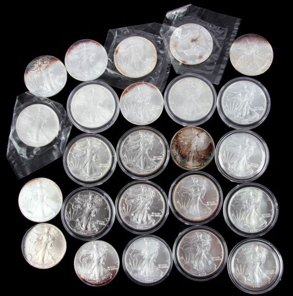 24 UNCIRCULATED SILVER AMERICAN EAGLE COIN LOT: Dates are as follows: 1986, 1988, 1989, 1990, 1991, 1992, two 1994, two 1995, four 1997, 1998, 1999, 2000, two 2001, 2002, 2003, two 2004, 2005.