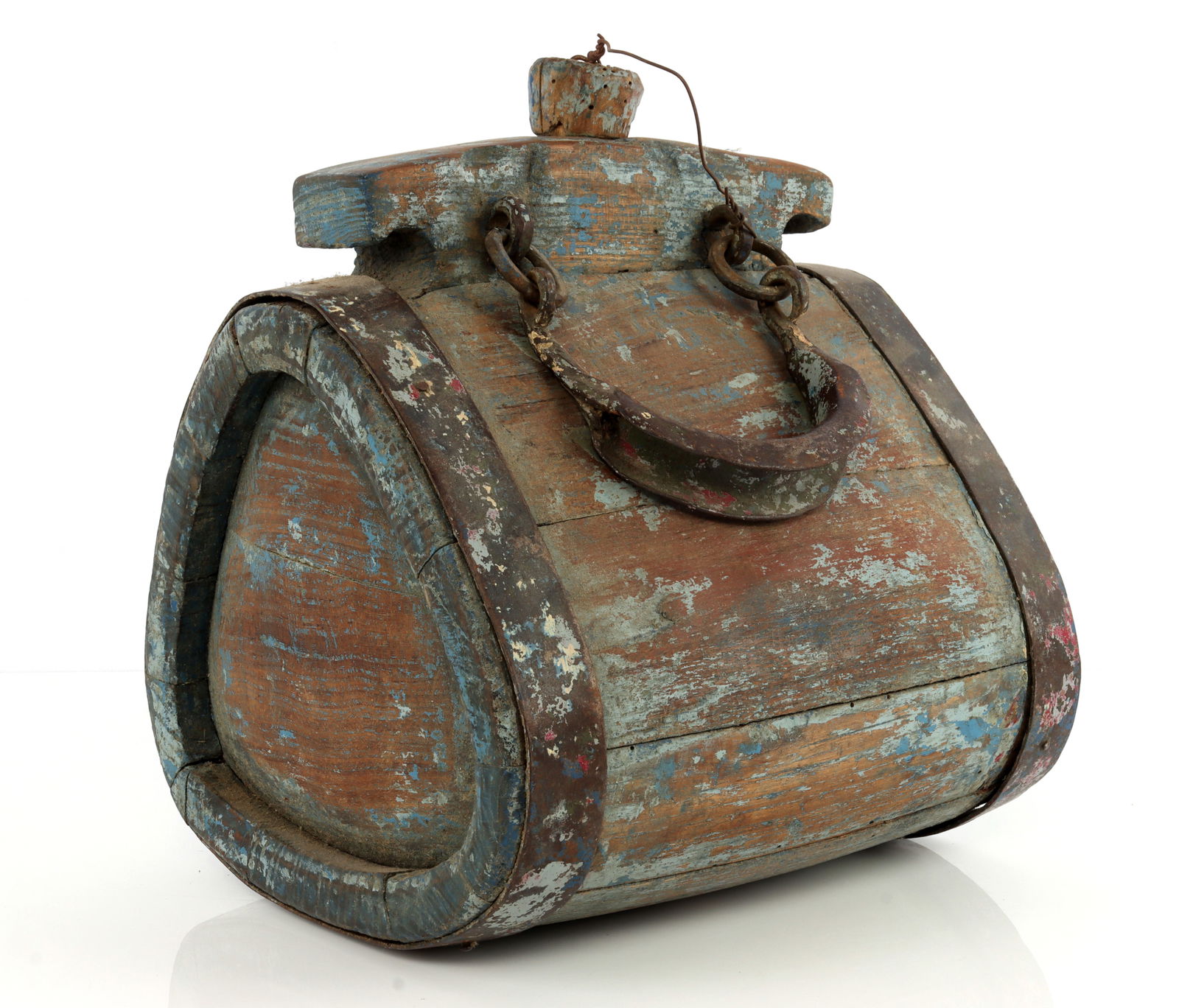 LARGE REVOLUTIONARY WAR CANTEEN WITH BLUE PAINT: A wooden barrel canteen from the American Revolution. The canteen shows three distinct layers of paint: red, blue, and light blue; these shifting paint jobs indicate different jurisdictional use for t
