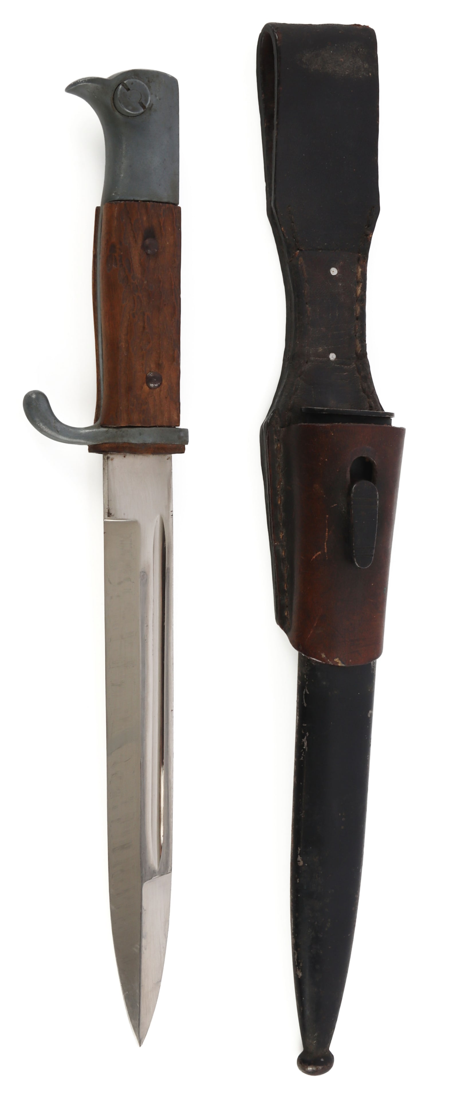 WWII GERMAN K-98 FIREMAN WALKING OUT BAYONET: Very good original condition, blade is as new, some light oxidation on scabbard. Wood but designed to look like stag grip.