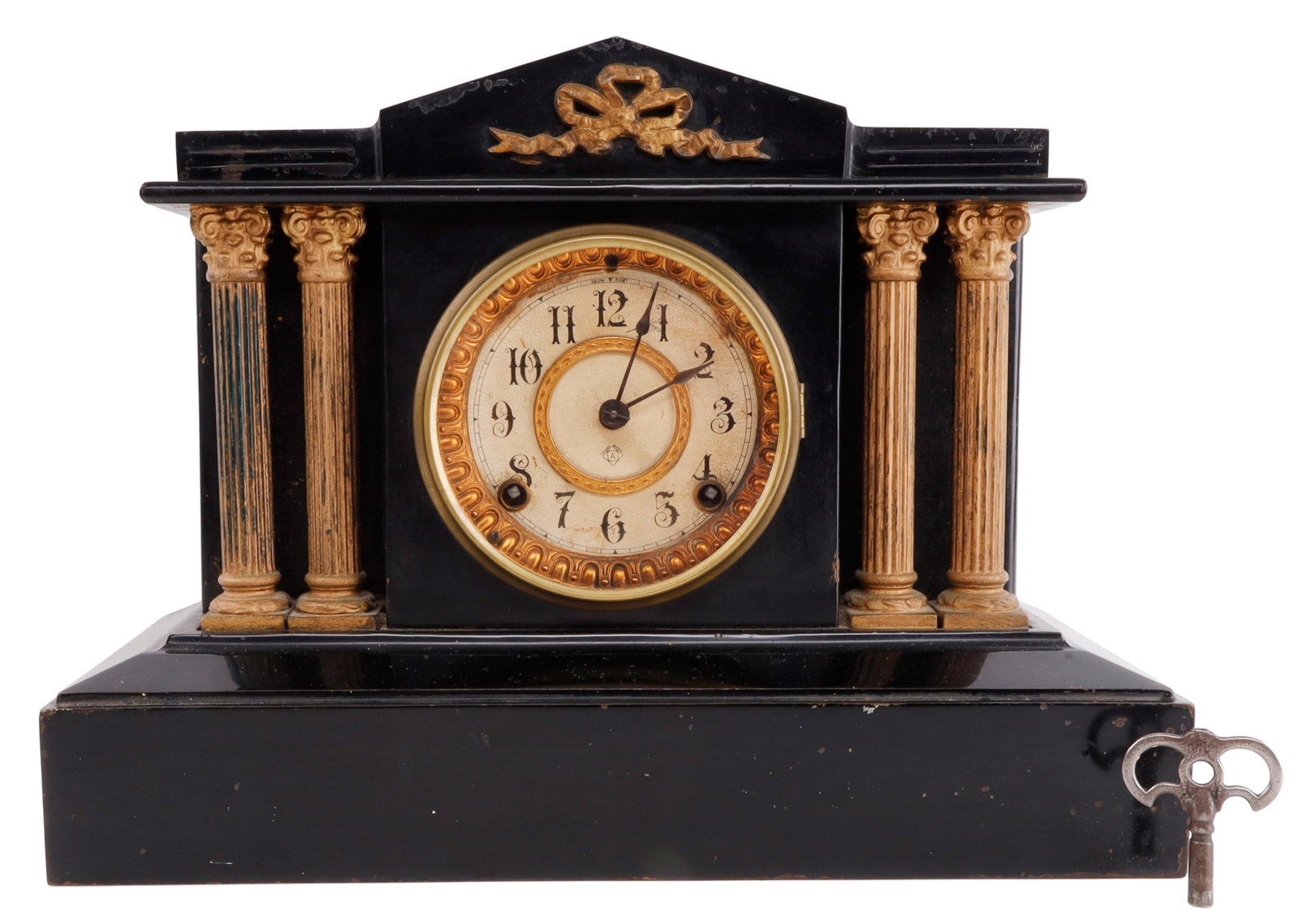 ANTIQUE ANSONIA BLACK SLATE MANTLE CLOCK: Working condition, but needs servicing, with key, starts on its own with a few turns, and keeps good time. Measures 15 x 11 x 6 inches.