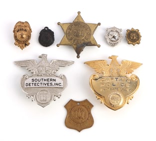 LOT OF 8 OBSOLETE LAW ENFORCEMENT BADGES