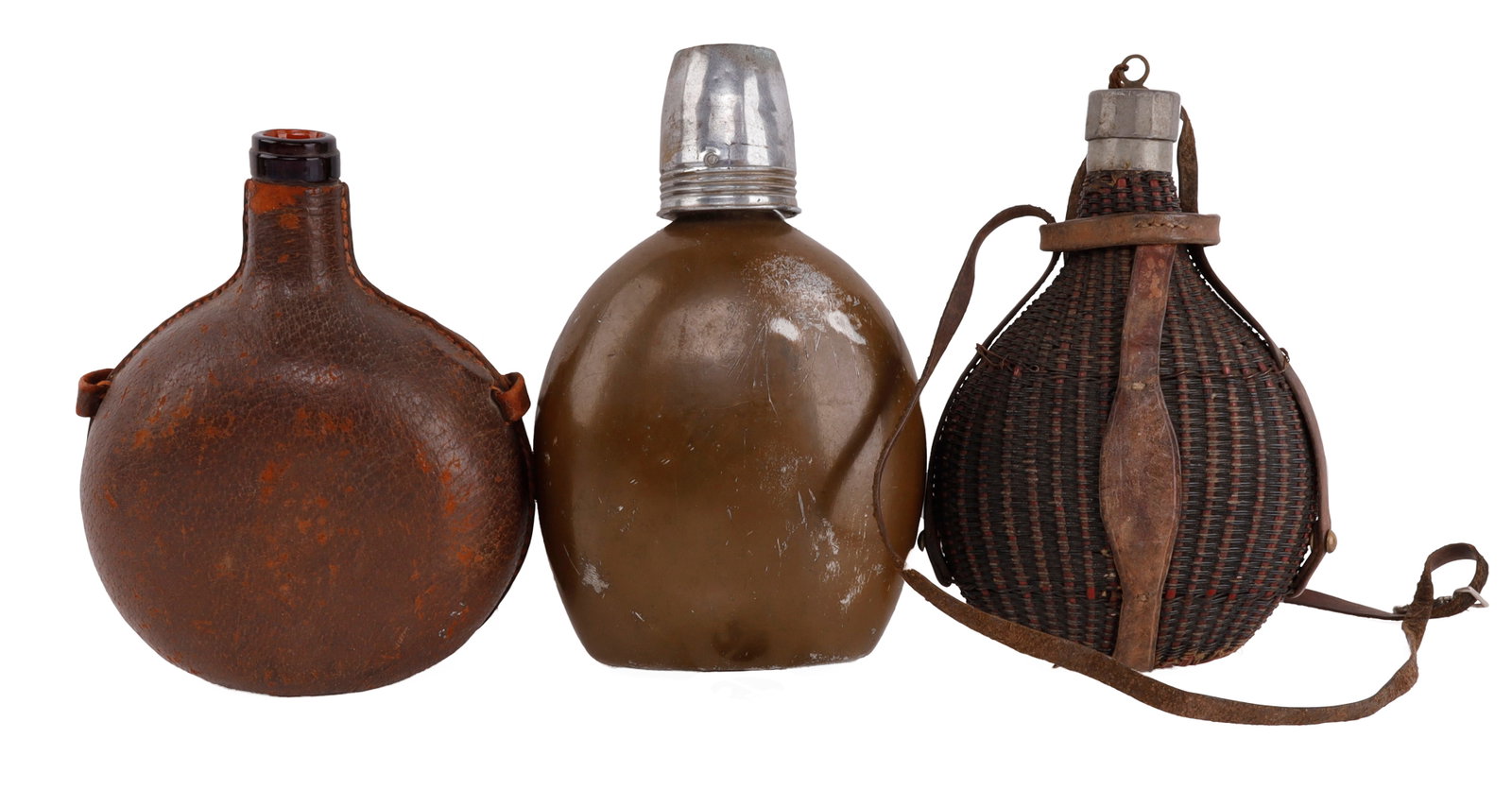3 ANTIQUE CANTEEN LOT WICKER & GLASS JAPAN W MAKER: 1 Wicker and glass, 1 leather and glass, and 1 WWII Japanese with maker mark on cup and base of canteen. All very good original condition.