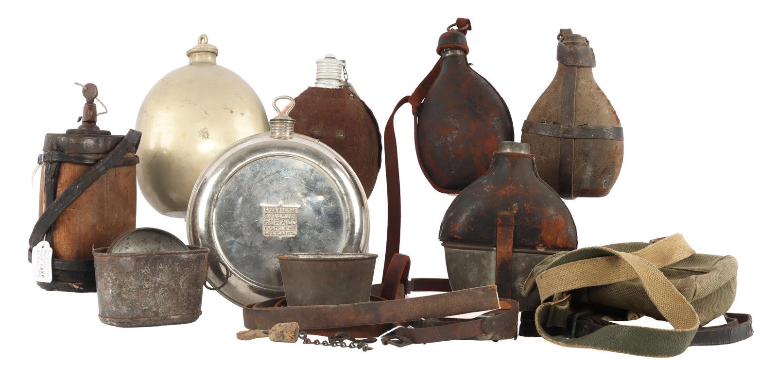 7 CANTEEN LOT U.S GERMAN JAPANESE ITALY WOOD GLASS: Nice variety of canteens. Wood Italian, German WWI glass, Austro German, oversize Japanese with Kiln mark on base, Austro Hungary Glass, early canteen, U.S. Stainless for the Syracuse Herald, and a Ru