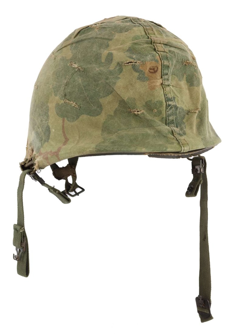 VIETNAM US M1 HELMET & M1C LINER PEACE CAMO COVER: US M1 helmet with reversible camouflage cover and Firestone M1C paratrooper type liner. Swivel chinstrap loops, rear seam. Helmet lot code stamp not visible. Liner interior has Firestone maker's mark 