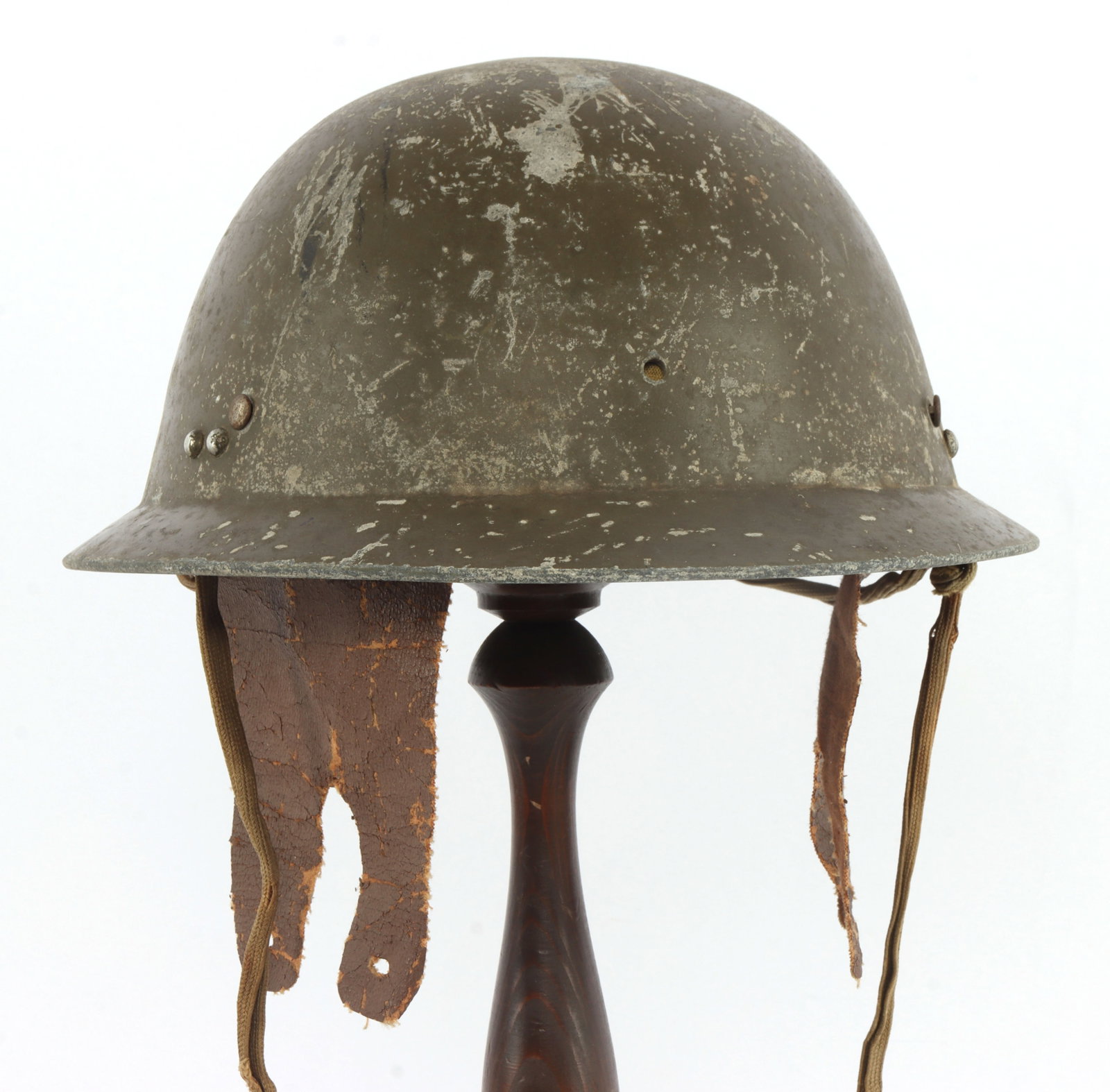 WWII JAPANESE CIVIL DEFENSE HELMET WITH LINER: Imperial Japanese civil defense helmet with liner and chinstrap. Non-magnetic alloy shell. Liner marked in black ink. Good condition.