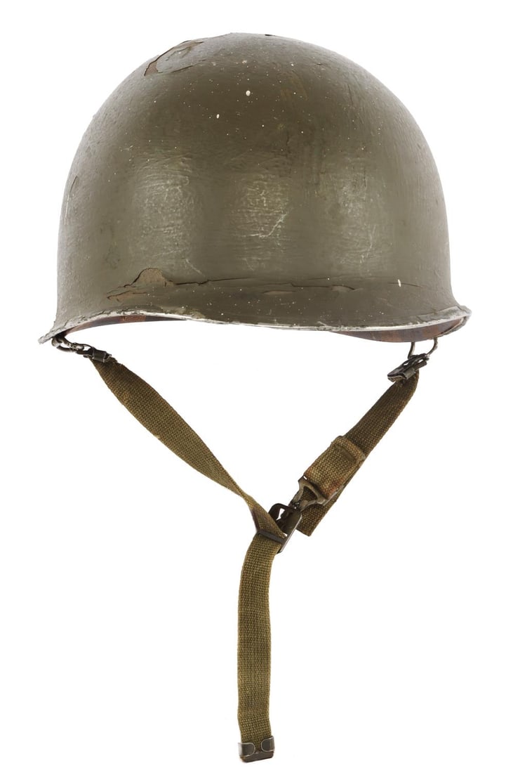 WWII US M1 STEEL COMBAT HELMET WITH LINER: M1 helmet with chinstrap and liner. Front seam, swivel chinstrap loops. Lot code stamped at visor, partially obscured by paint. Westinghouse liner with grommet for insignia in front. Very good conditi