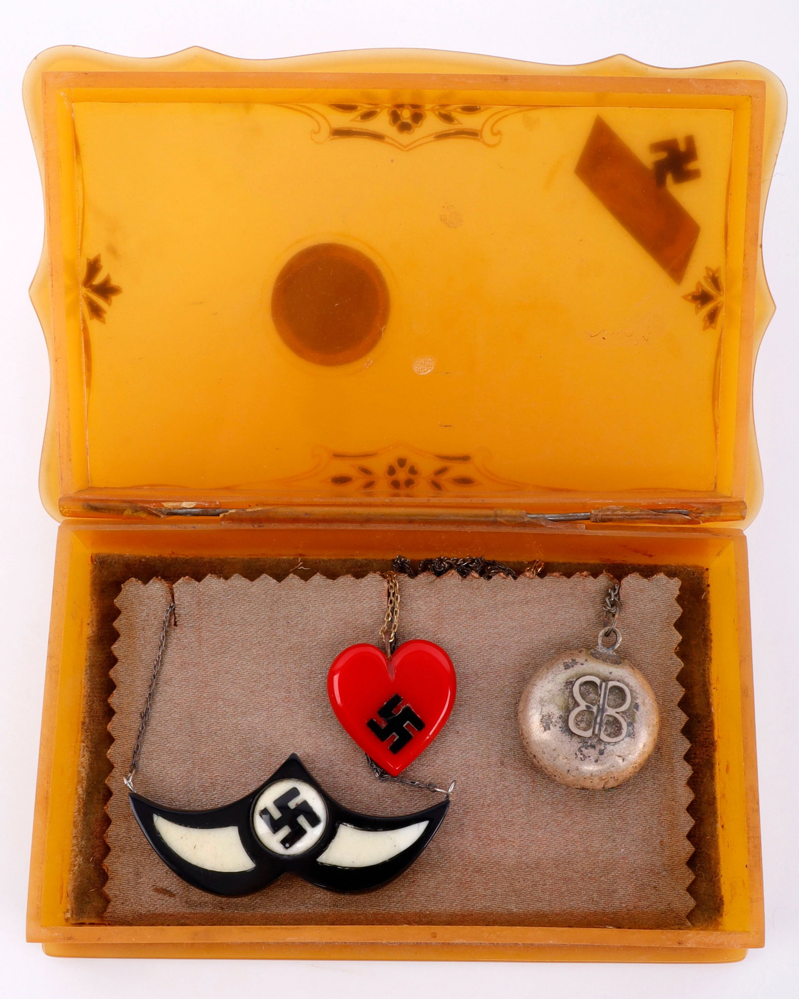 WWII GERMAN EVA BRAUN STYLED JEWELRY BOX: Orange plastic box with EB initials. Comes with necklaces. Contemporary.