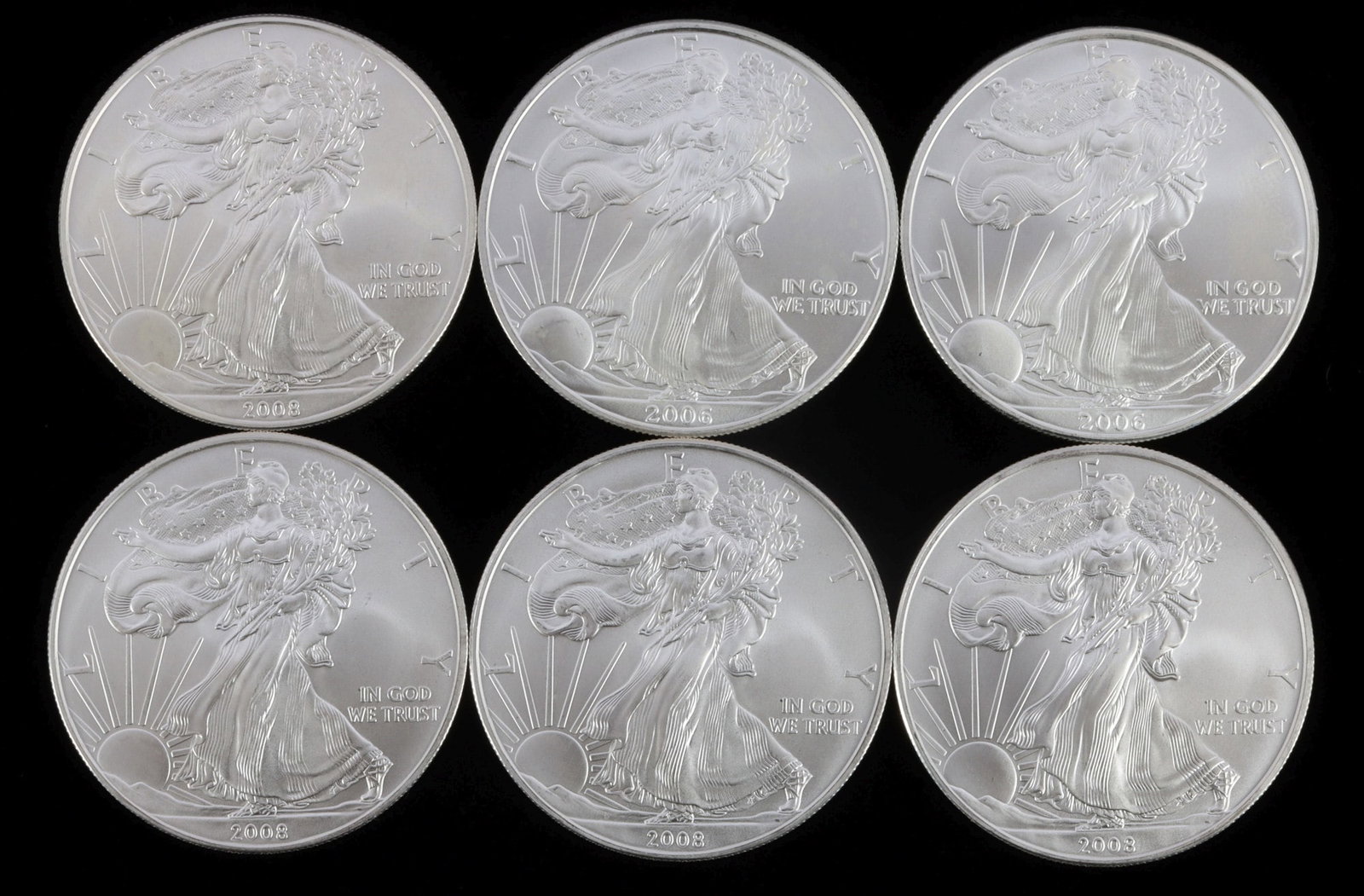 6 MIX DATE 1 OZT OUNCE SILVER AMERICAN EAGLE COINS: Mixed date. Brilliant uncirculated. This lot reserved at melt.