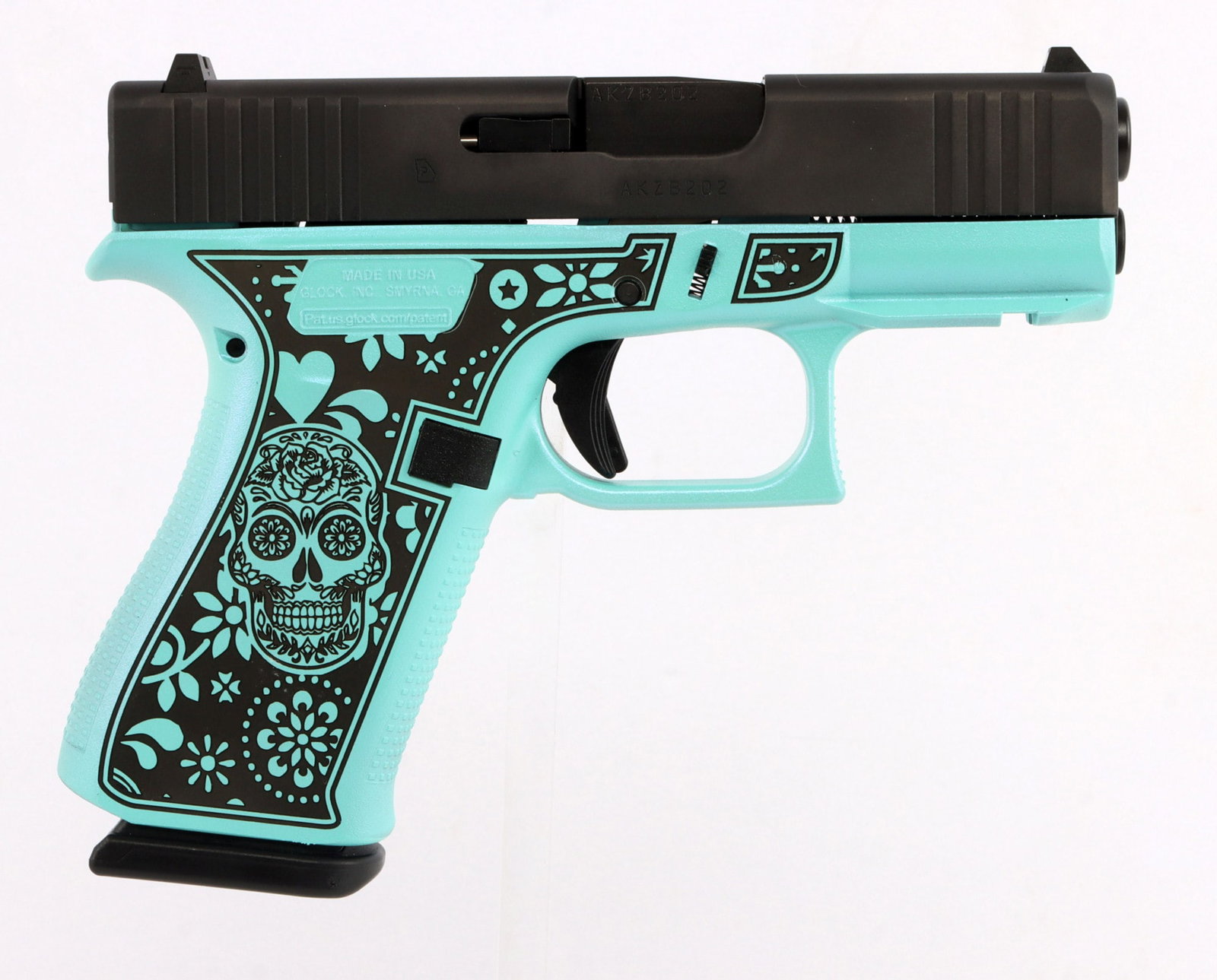 GLOCK 43X SUGAR SKULL GLITTER CERAKOTE 9MM PISTOL: New in box Glock 43X semi-automatic pistol with custom Robin's Egg Blue "Sugar Skull" Cerakote. Includes two (2) 10-round magazines. FFL required for transfer. No international shipping. Know your sta