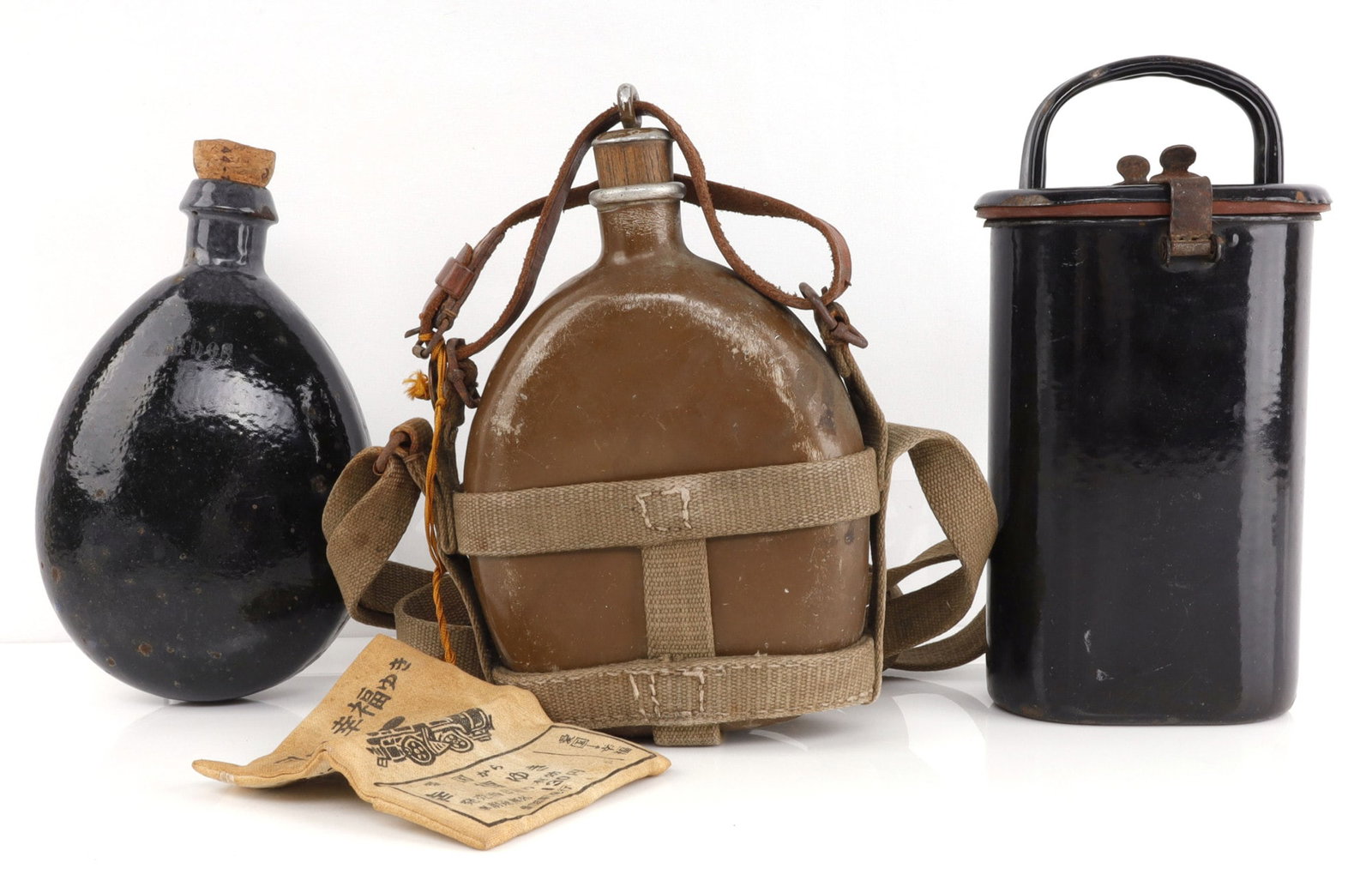 3 CANTEEN LOT JAPANESE RAILROAD: Japanese Railroad canteen, a black container, and one other.