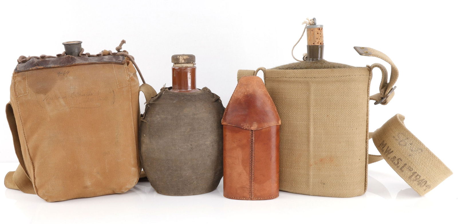 4 WWI WWII CANTEEN FLASK LOT JAPAN EUROPE: The larger one id tagged WWI private purchase canteen and mess kit, small whiskey flask, cover top is loose, Japanese is brown ceramic, and one dated 1940.