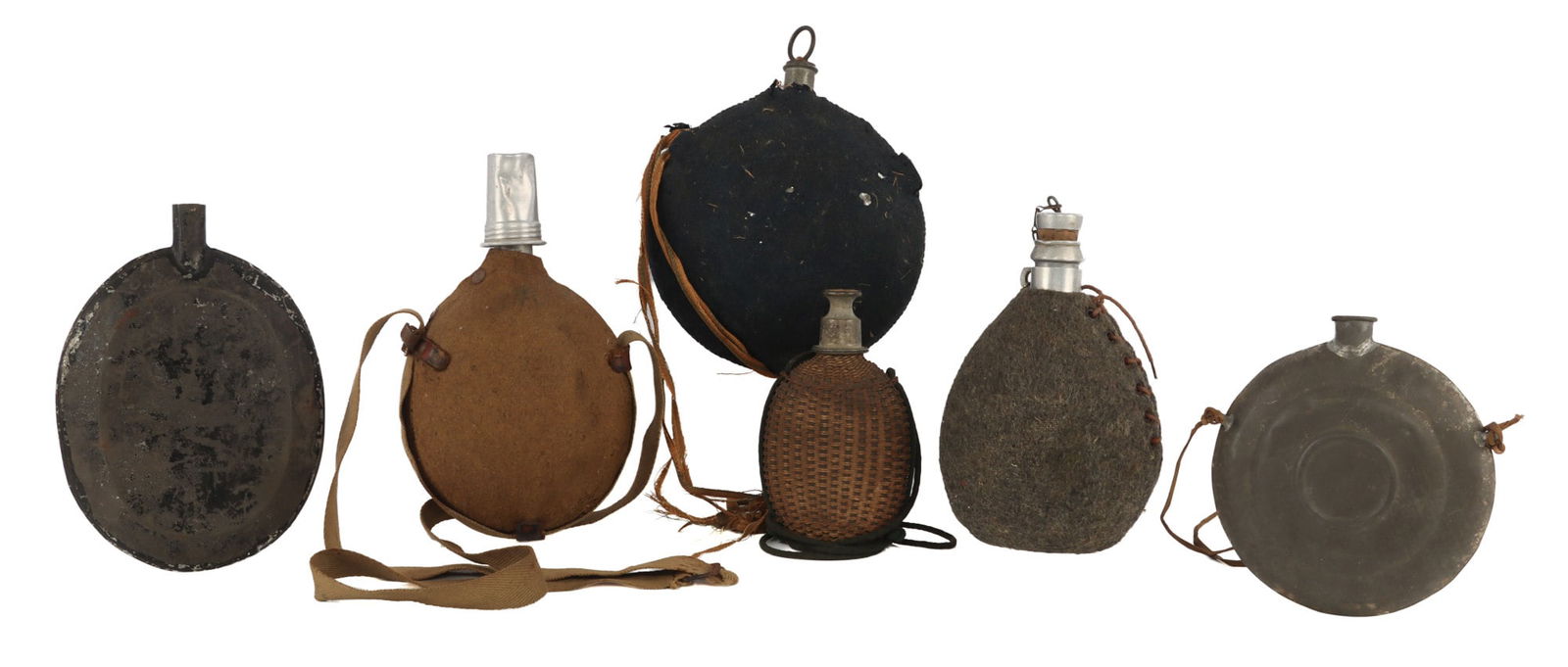 6 CANTEEN LOT CIVIL WAR GREEK CONFEDERATE: Possible Wicker and glass flask, stamped spout Union canteen and 4 other Euro canteens.