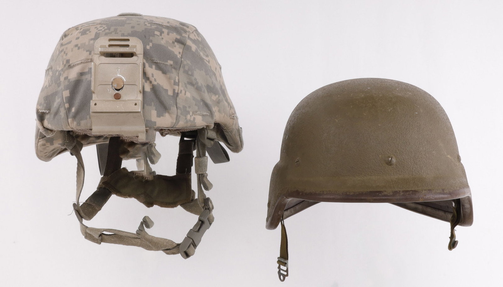2 DESERT STORM PASGT HELMET LOT 1 W CAMO COVER: The camo cover is very good and complete, chin strap padding and more, the uncovered has more wear, lacks chin strap, stamped M2 at crown.