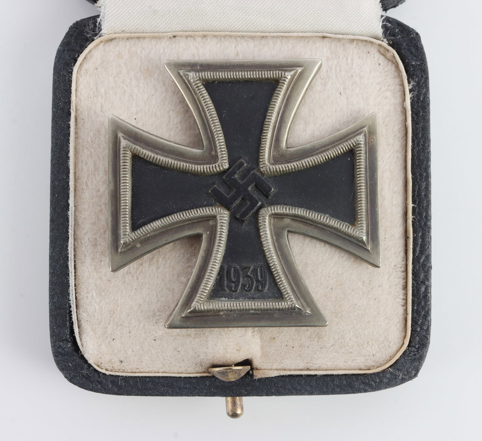 WII GERMAN REICH IRON CROSS FIRST CLASS: Two piece soldered frame with magnetic iron core. Pin is marked 65 for maker Klein & Quenzer. Comes in fitted case. Cross measures 1 3/4 inches. This lot has a reserve.