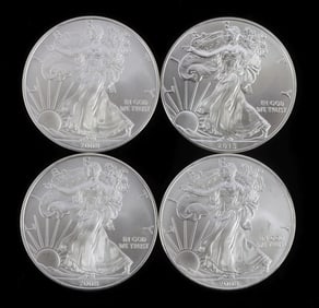 LOT OF 4 .999 1 0ZT SILVER EAGLE BU MIXED DATE