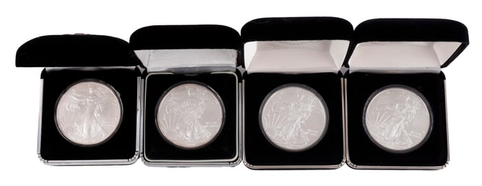 LOT OF FOUR CASED US SILVER AMERICAN EAGLES