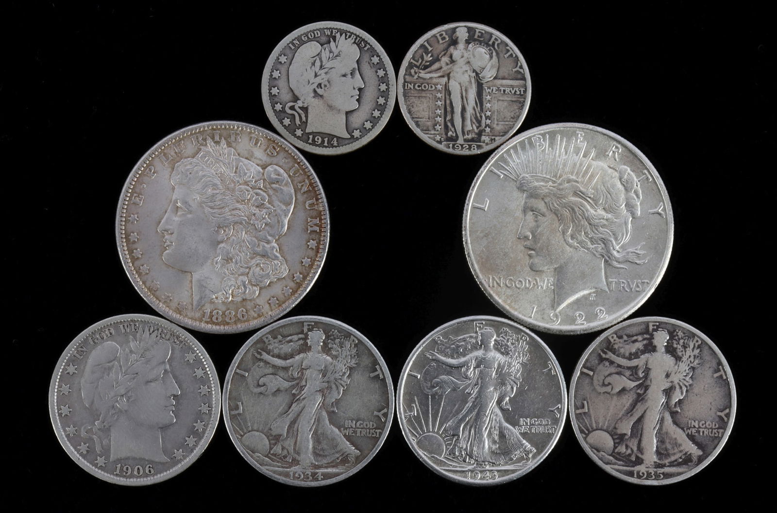 U.S. COIN COLLECTION PEACE MORGAN BARBER STANDING: Includes 1922 S BU peace dollar, 1886 EF Morgan, full breast feathers, 1906 D, Barber Half VG, 1943 S BU Walker, 1934 and 1935 circulated walkers, 1914 Barber quarter, circulated, and 1928 Standing Li