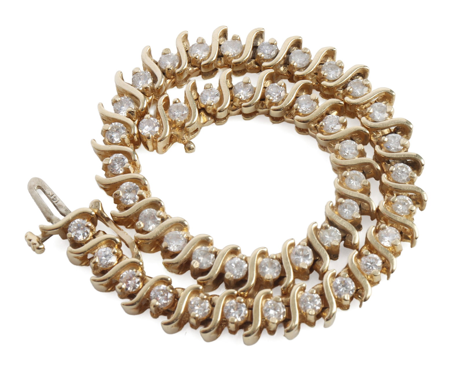 14KT GOLD TENNIS BRACELET WITH DIAMONDS: 19.2 grams of 14KT gold. 8 inches. Very good, original condition. This lot has a reserve.