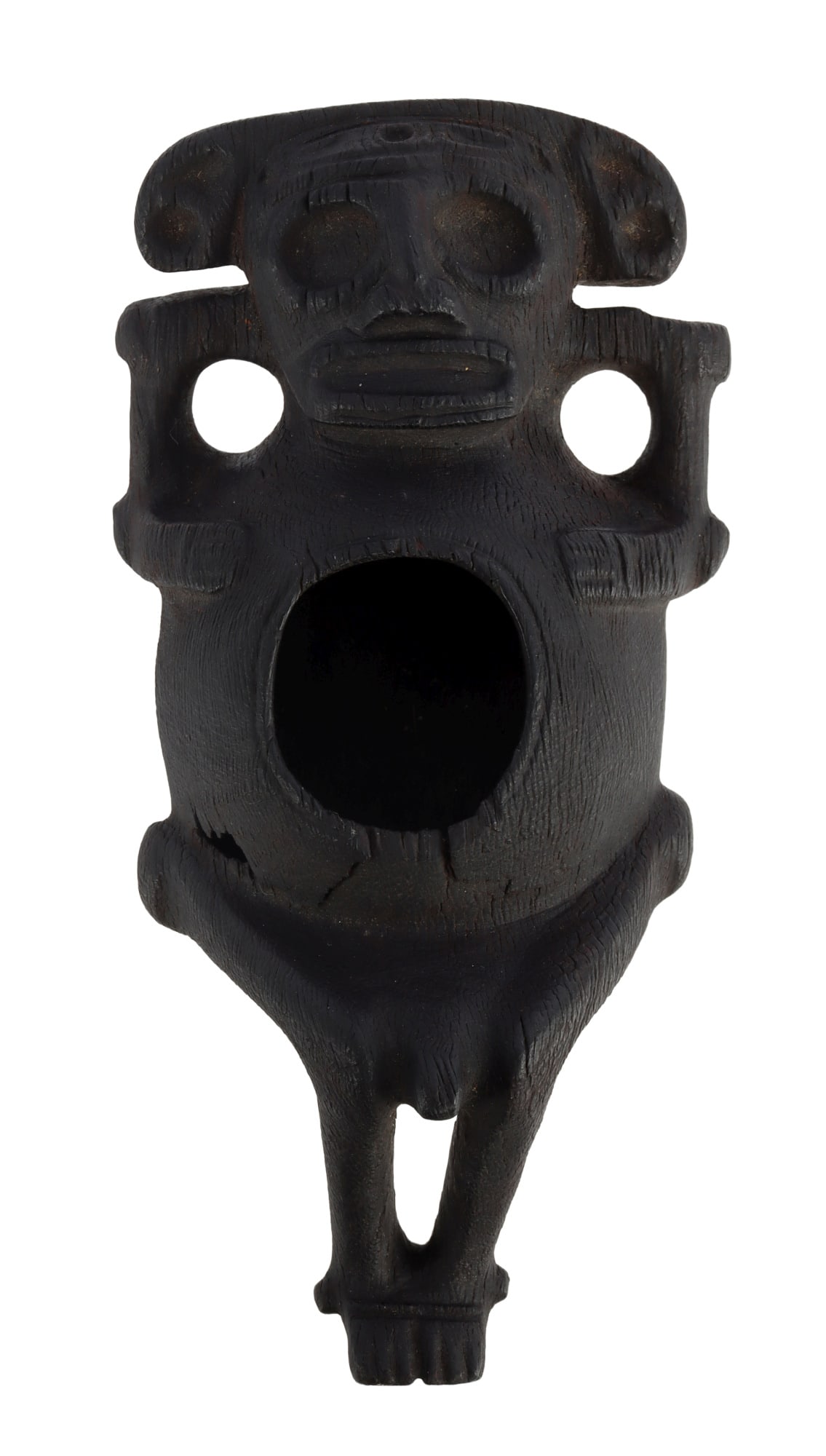 PRECOLUMBIAN TAINO LIGNUM VITAE VESSEL: An extremely rare lignum vitae anthropic cohoba vessel. The head is braced by two bird head ornaments and a small icon of two opposing bird heads cover the forehead. The eyes and mouth are defined by 