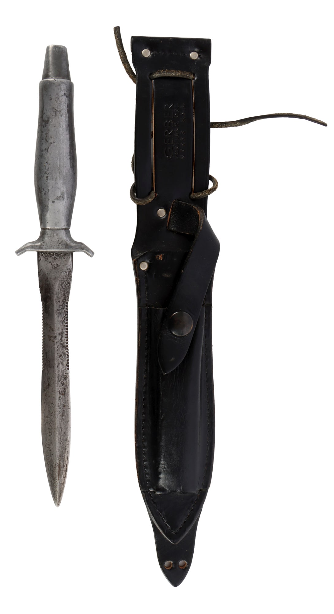 VIETNAM WAR GERBER MARK II SURVIVAL KNIFE & SHEATH: Gerber Mark II Survival Knife with black leather sheath. Gray Armorhide Type 2 with narrow wasp 6.5-inch blade. Ricasso marked "Gerber Portland Ore USA" and, on reverse, serial "025865." Sheath marked