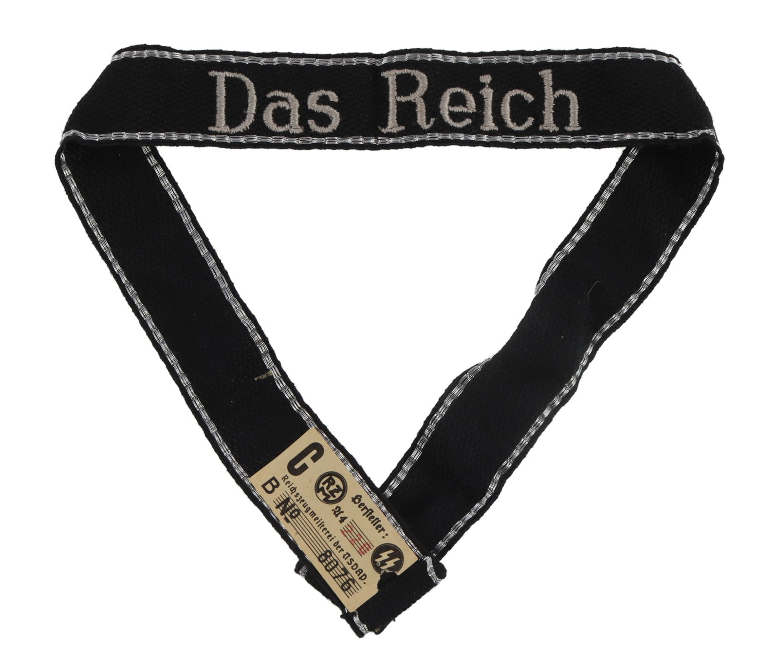 WWII GERMAN SS PANZER DIVISION CUFF TITLE RZM TAG: Waffen-SS 2nd Panzer Division "Das Reich" cuff title with paper RZM/SS label. Top and bottom border embroidered in thin silver bullion wire on black woven cloth band. Length 19-1/2 inches. Height 1-5/
