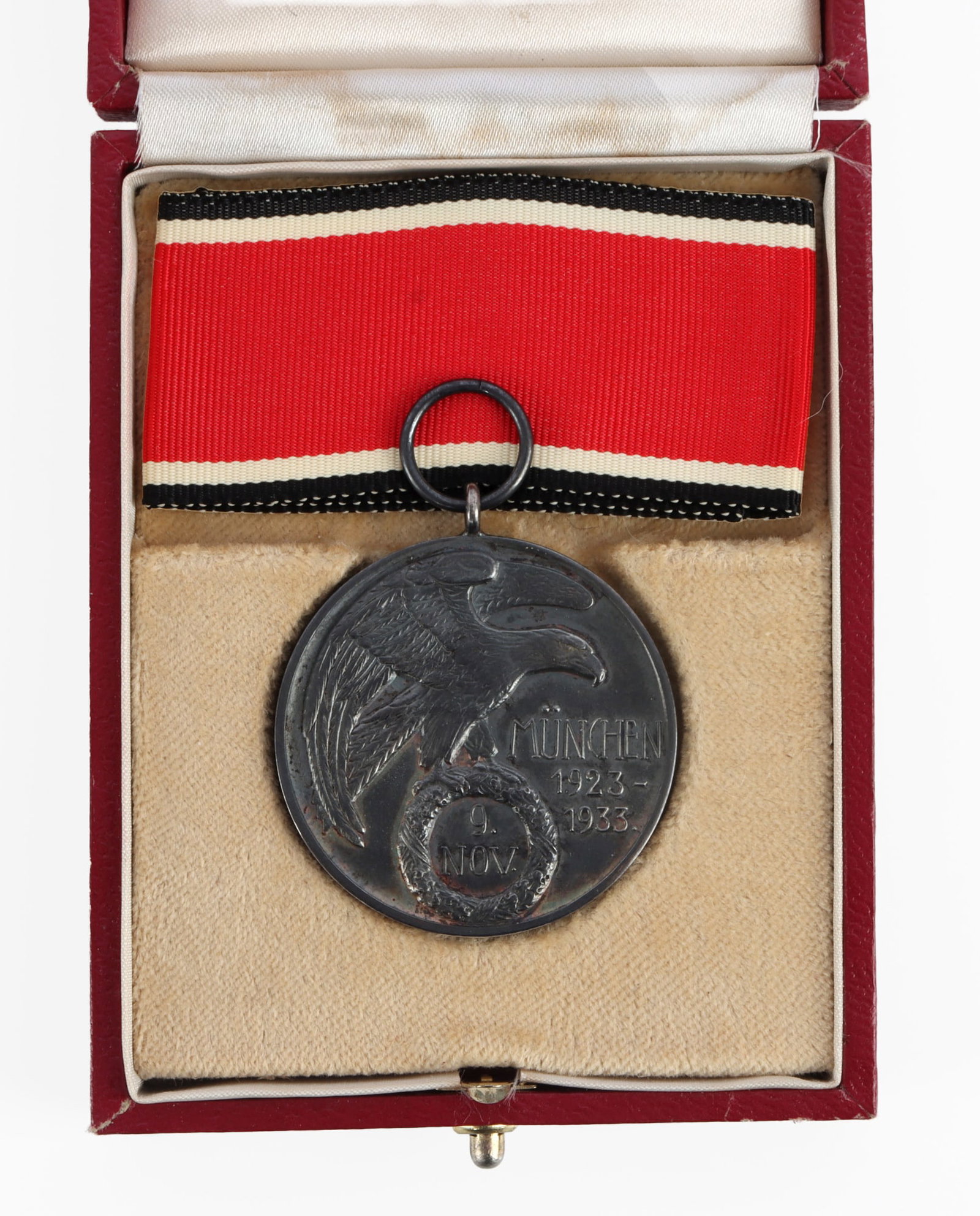 WWII GERMAN THIRD REICH BLOOD ORDER MEDAL: It measures 1.5 inches. Weighs 26.4 grams. Serialized 2085. Marked 800 for silver. Very good condition with case toning. This lot has a reserve.