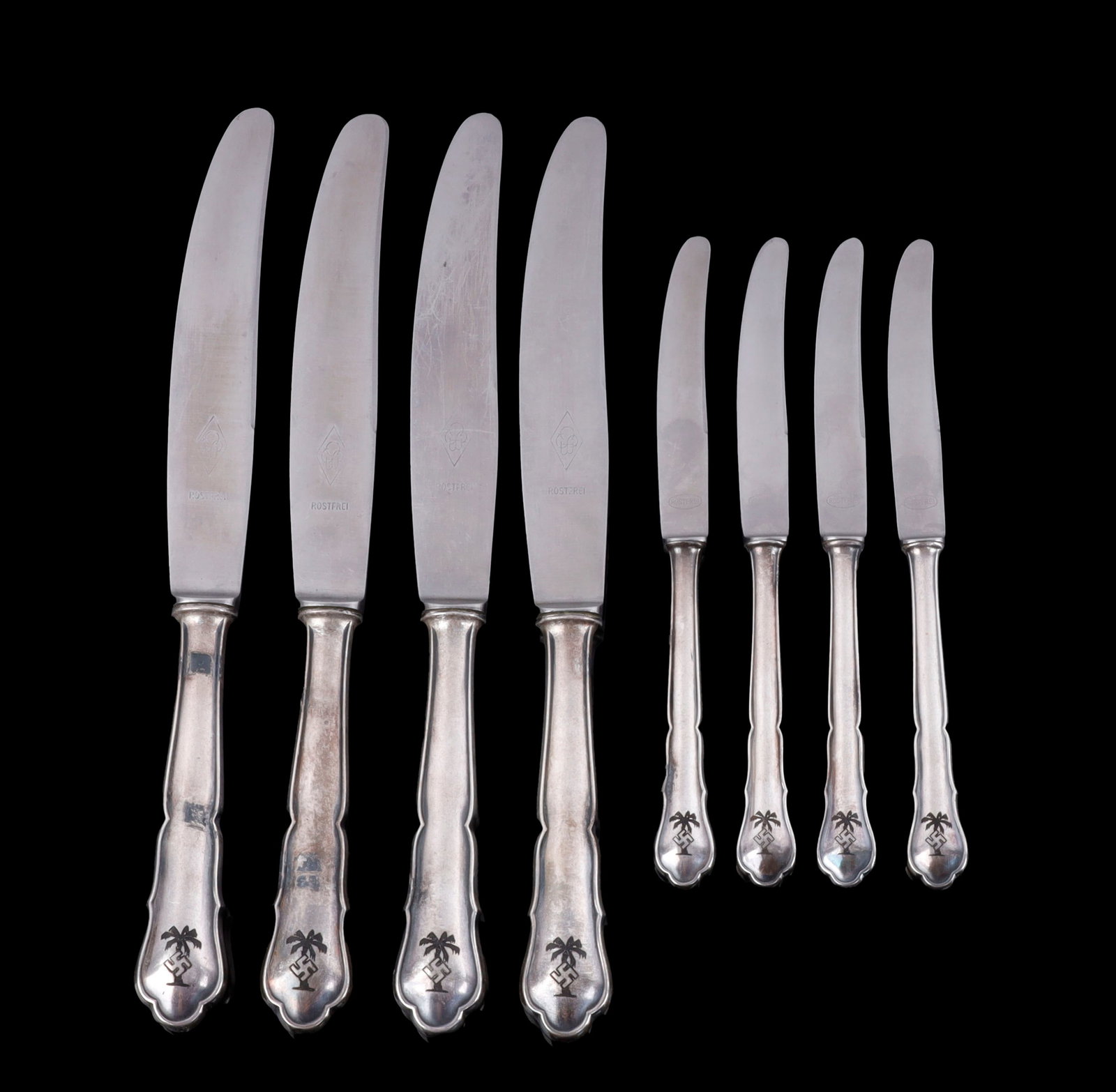WWII GERMAN THIRD REICH SILVERWARE LOT OF 8: Eight knives bearing the marks of the German Afrika Korps (DAK). Unauthenticated, sold as is.