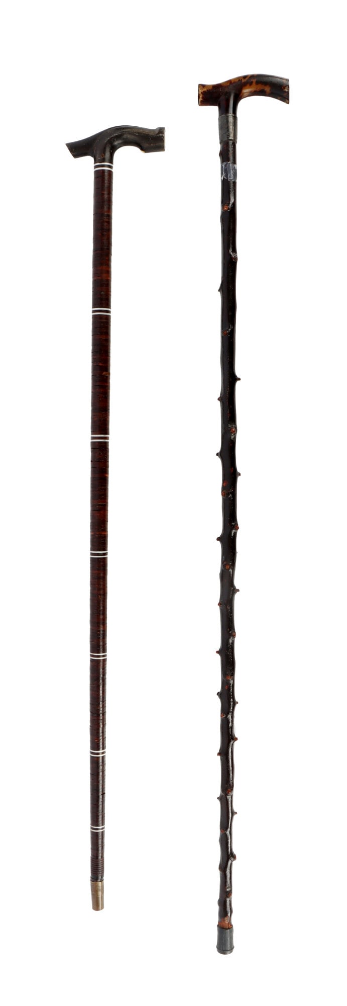 ANTIQUE WALKING CANES LOT OF 2: Blackthorn cane has a resin crutch handle with a tortoise shell pattern. Silver collar engraved with initials, dated 1904. Made in Dublin. Measures 38 1/2 inches. Leather wrapped cane with aluminum ri