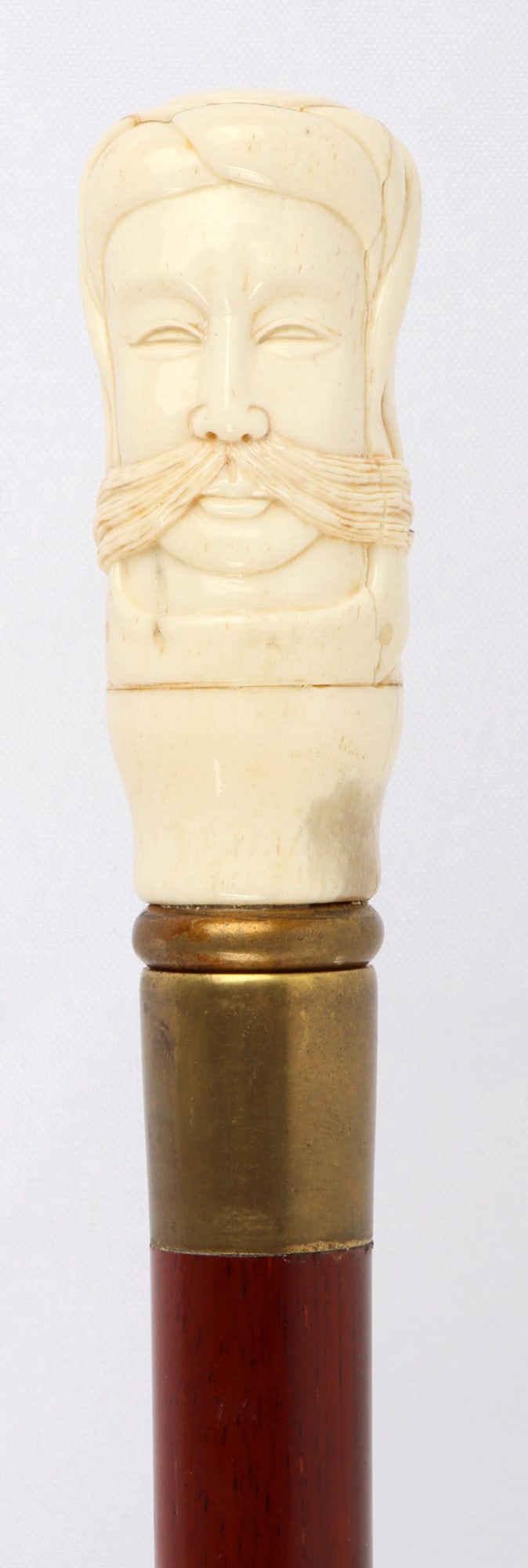 BONE CARVED TURK HEAD WALKING STICK CANE: Likely a depiction of a Turk. Measures 35 3/8 inches.