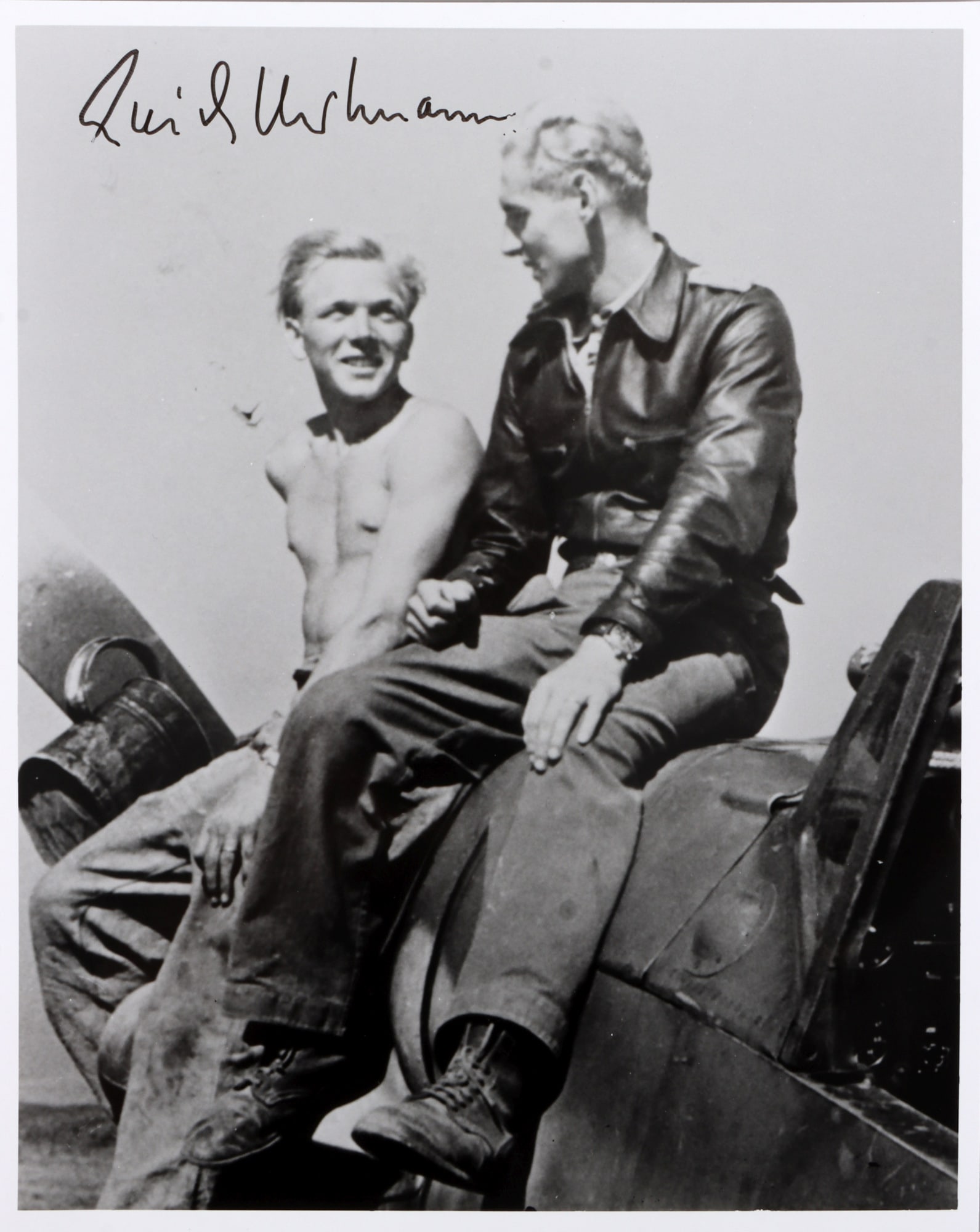 WWII GERMAN THIRD REICH ERICH HARTMANN SIGNATURE: A signed image of Eric Hartmann, German ace of aces widely regarded as the top combat pilot of the war. The autograph is from Hartmann, and was given after the war to assist in charity drives for woun
