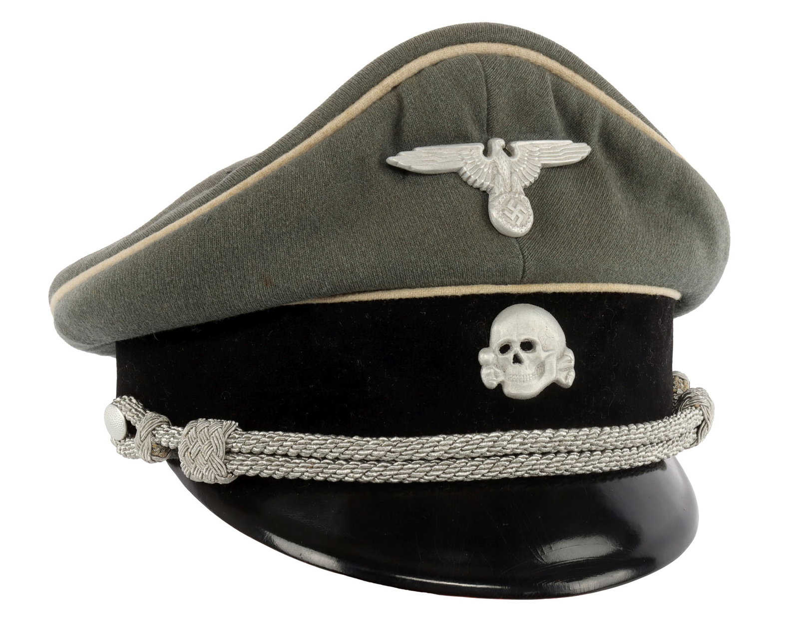 WAFFEN SS OFFICER VISOR WWII GERMAN REICH: Field grey with white piping, black velvet, aluminum bullion chin strap, and aluminum pins. The eagle measures 2 5/8 inches. The skull measures 1 3/16 inches. Aug Muller maker mark. Silk lining with s