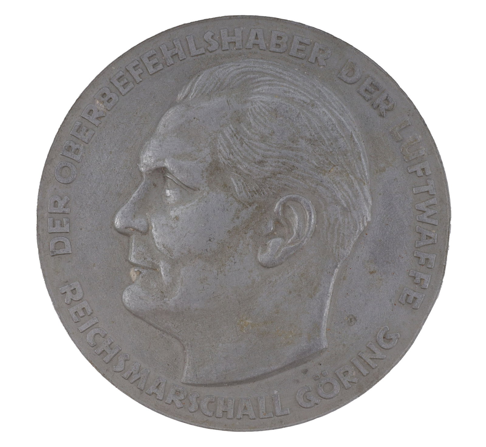 WWII GERMAN REICHSMARSHAL GORING LUFTWAFFE MEDAL: Commemorative medallion awarded for outstanding performance in service of the Luftwaffe. Hermann Goring bust in center, with Luftwaffe Reichsadler on back. Measures 3 inches in diameter. From featured