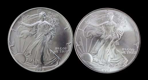 TWO .999 FINE SILVER AMERICAN EAGLES 1993 1997