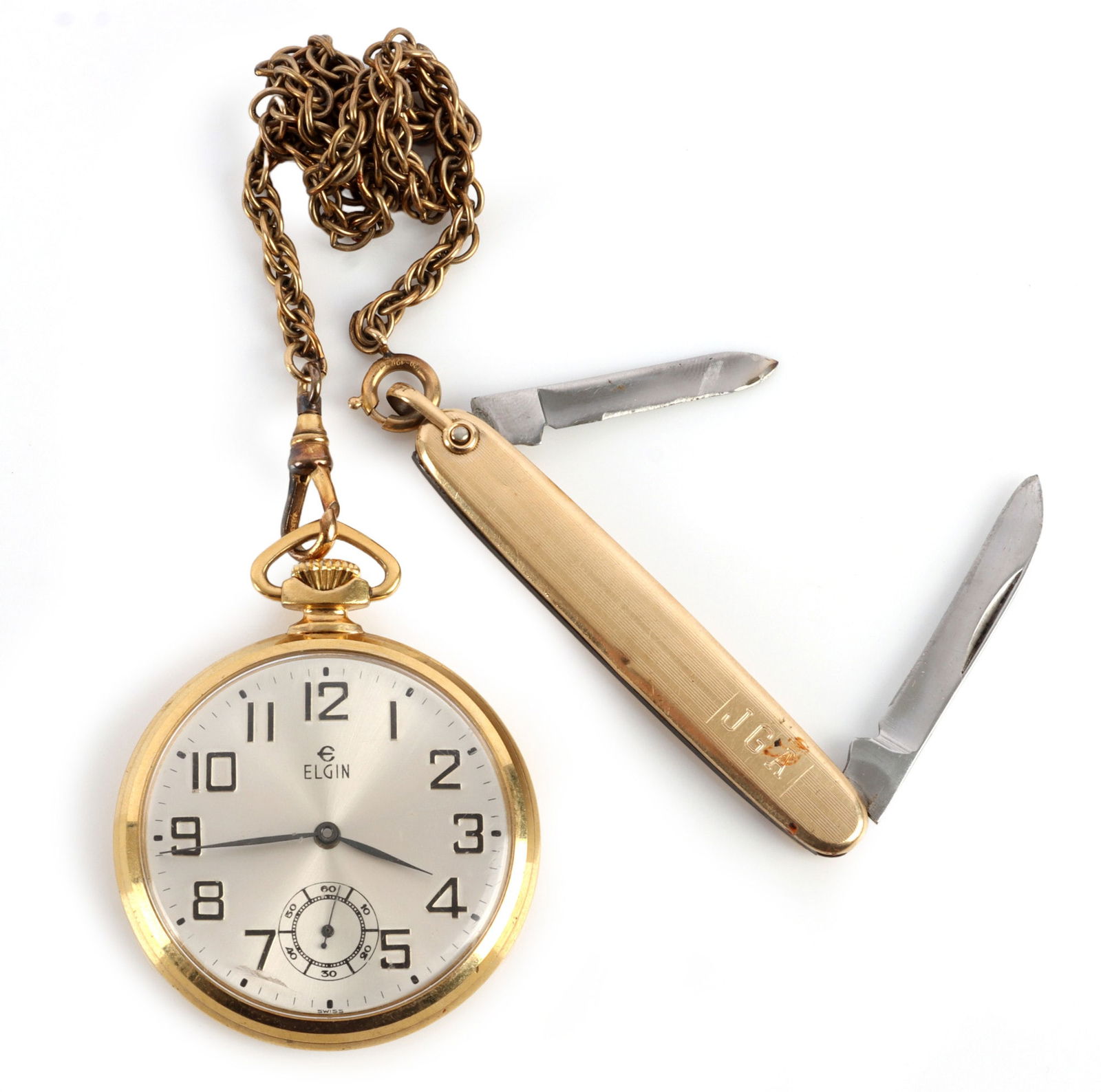 GOLD FILL ELGIN POCKETWATCH FOB & POCKET KNIFE: Strong movement, with no visible serial number , keeps time, and is very good original condition, with chain and gold plate pocket knife, watch is size 18. This lot reserved at melt.