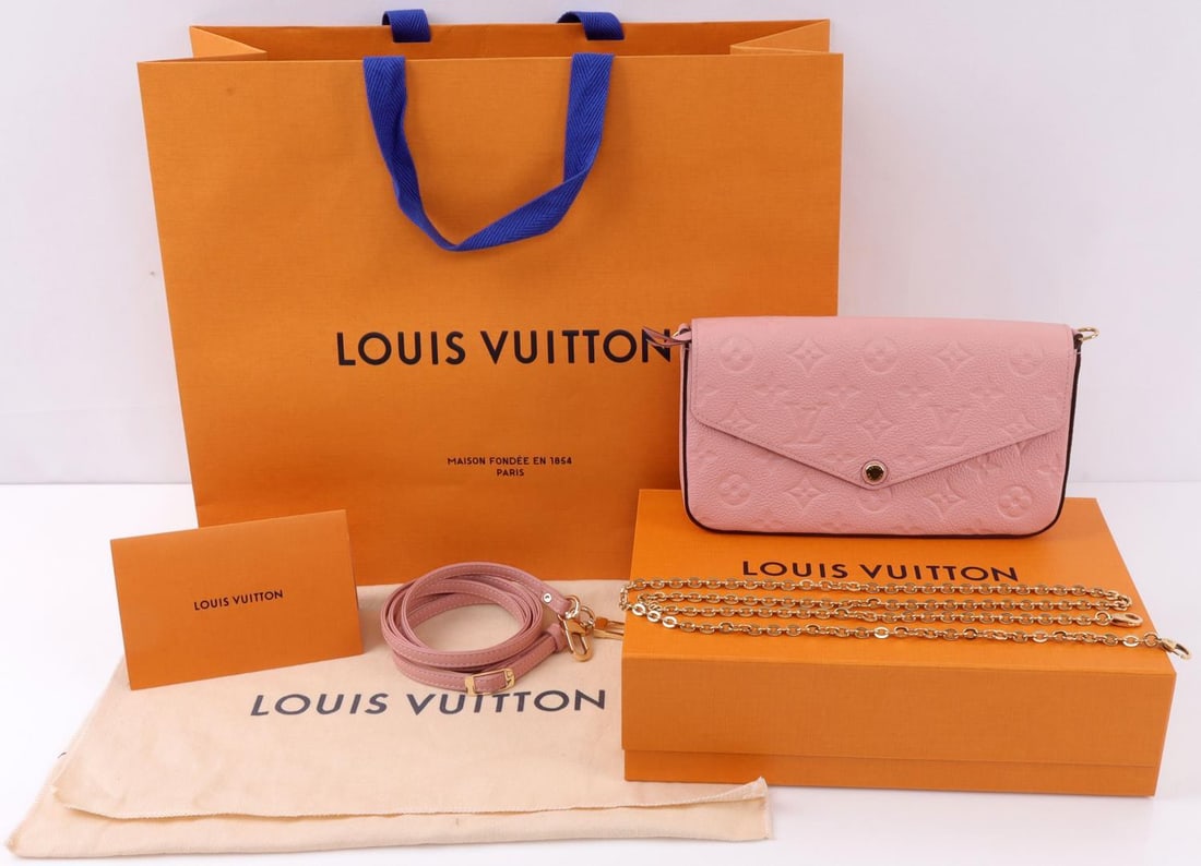 LOUIS VUITTON FELICIE MONOGRAMMED LEATHER ROSE: Louis Vuitton monogrammed empleinte leather felicie in the rose poudre color. Includes interior rose poudre leather interior pouches and original chain purse strap, as well as additional after-market 
