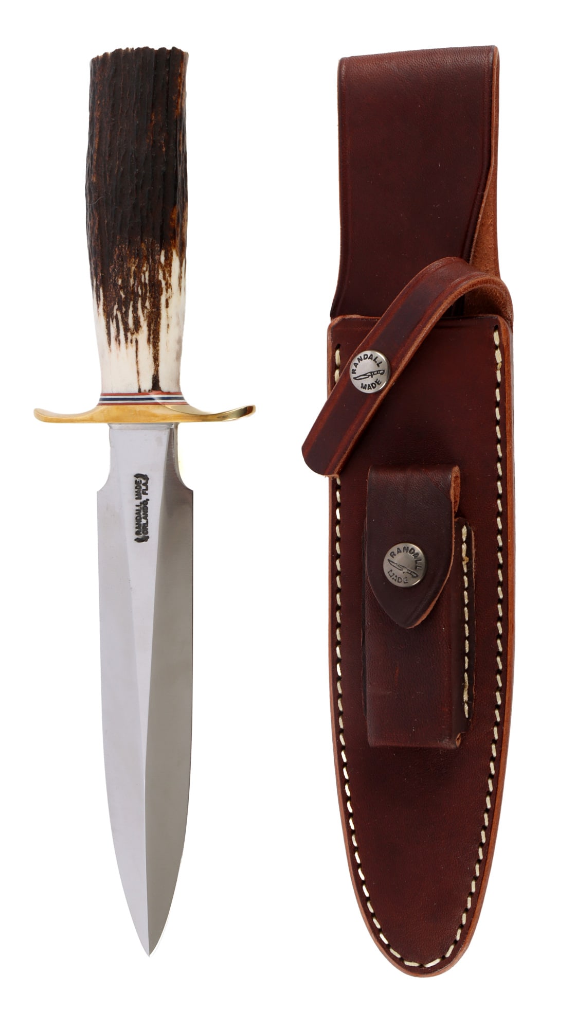 RANDALL MODEL 2 7 FIGHTING STILETTO: 7 inch blade, brass cross guard, and stag grip. Comes with leather sheath. Knife is brand new and never been in the sheath. This lot has a reserve.