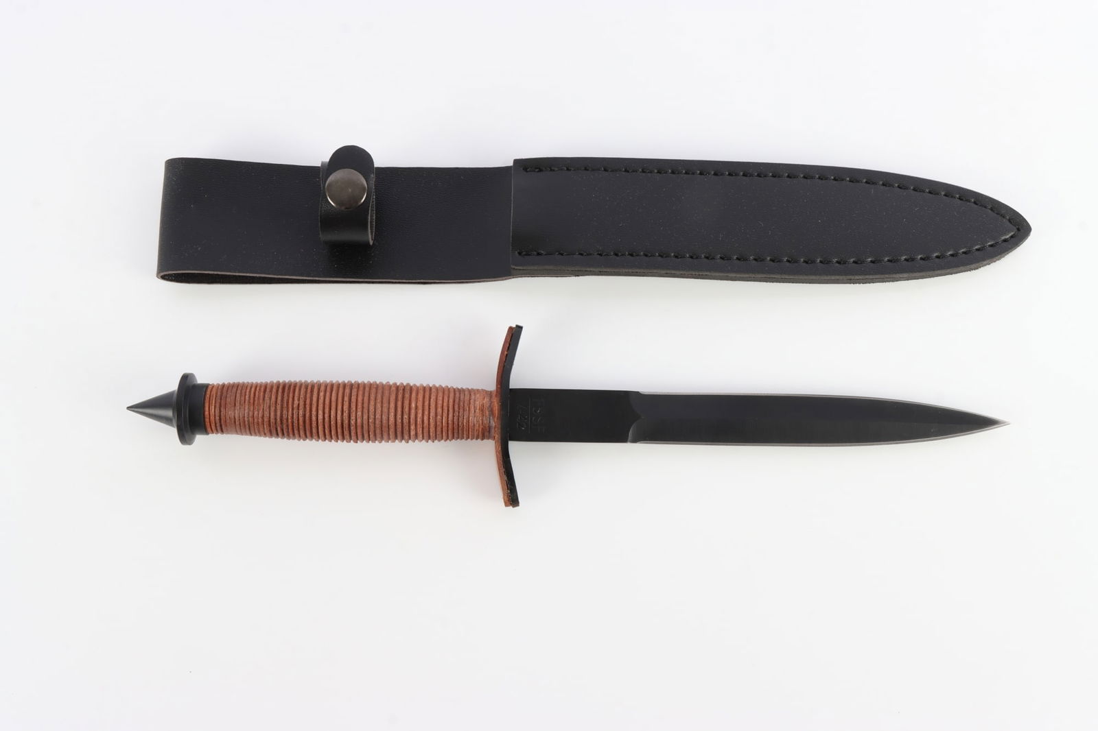 US MILITARY V-42 STILETTO FIGHTING KNIFE: A contemporary commercial version of the WWII era V-42 fighting stiletto used by US forces. 7.5 inch blade, 5.6 inch handle. With scabbard. New in box. Very good. original condition. This lot has a re