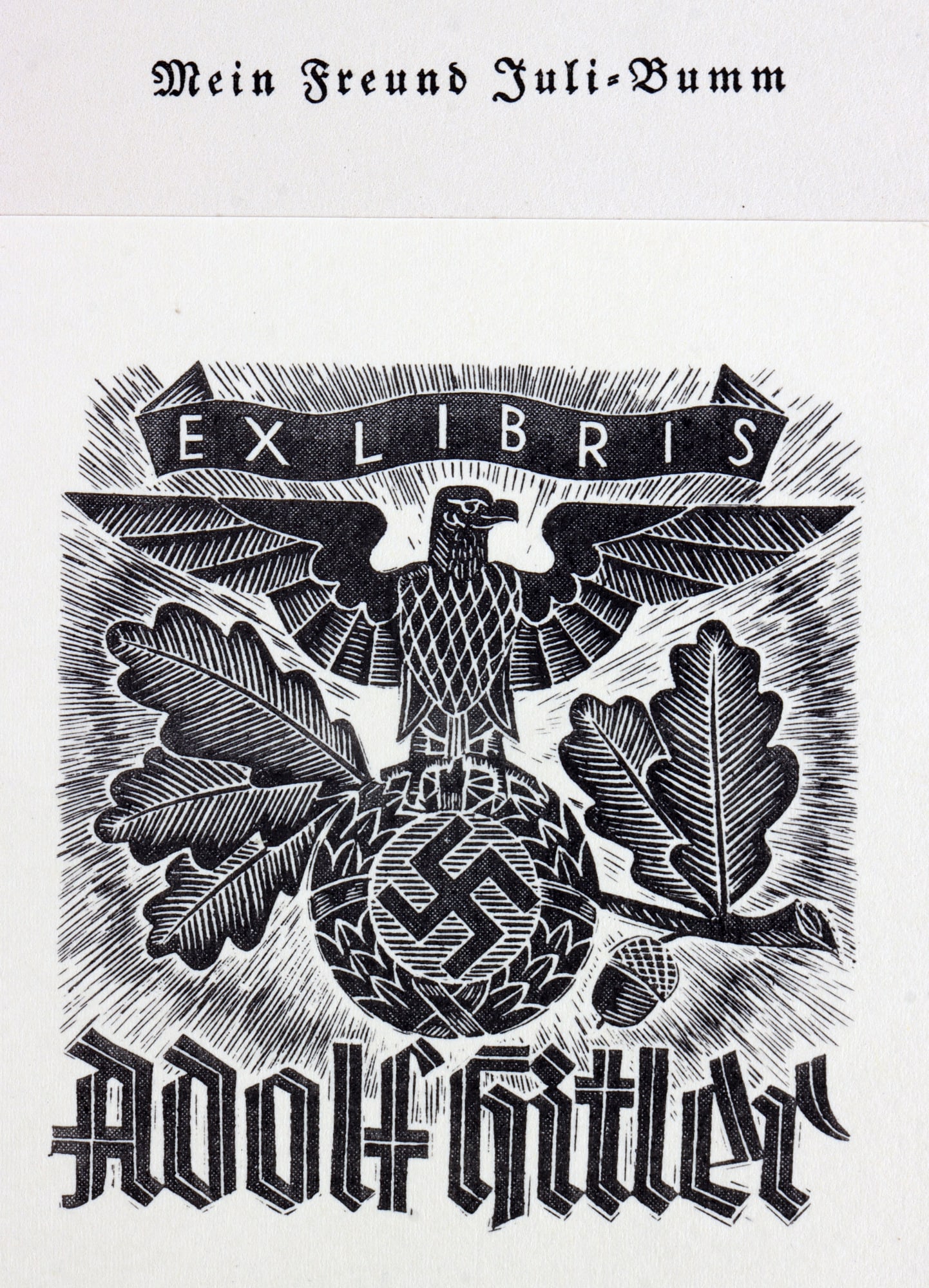 WWII GERMAN THIRD REICH HITLER EX LIBRIS LUCKNER: A Hitler ex libris stamp on the book Mein Freund Juli-Bumm by Graf Luckner. Unauthenticated, sold as is.