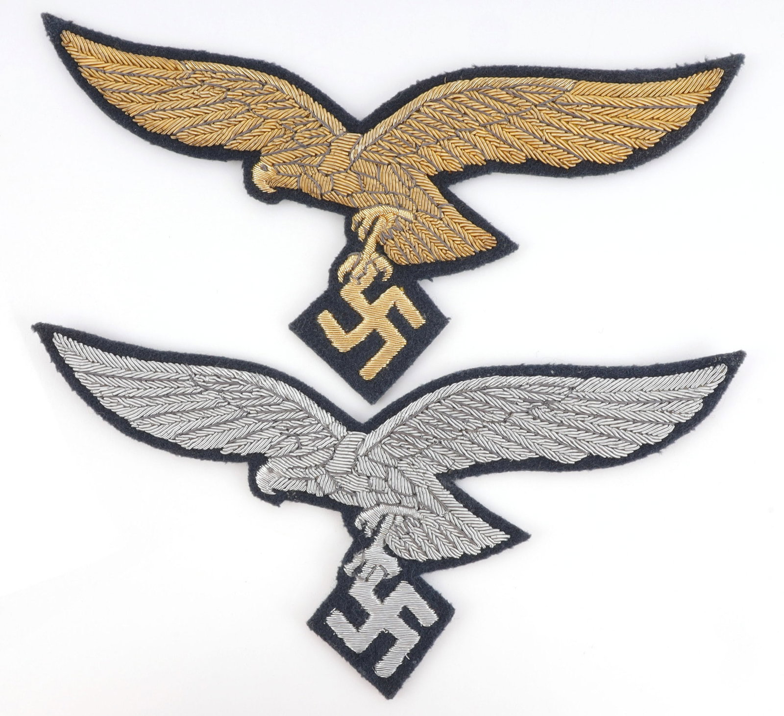 WWII GERMAN LUFTWAFFE BULLION CAPE EAGLES: They do slightly fluoresce, especially the silver one, they measure 7 inches