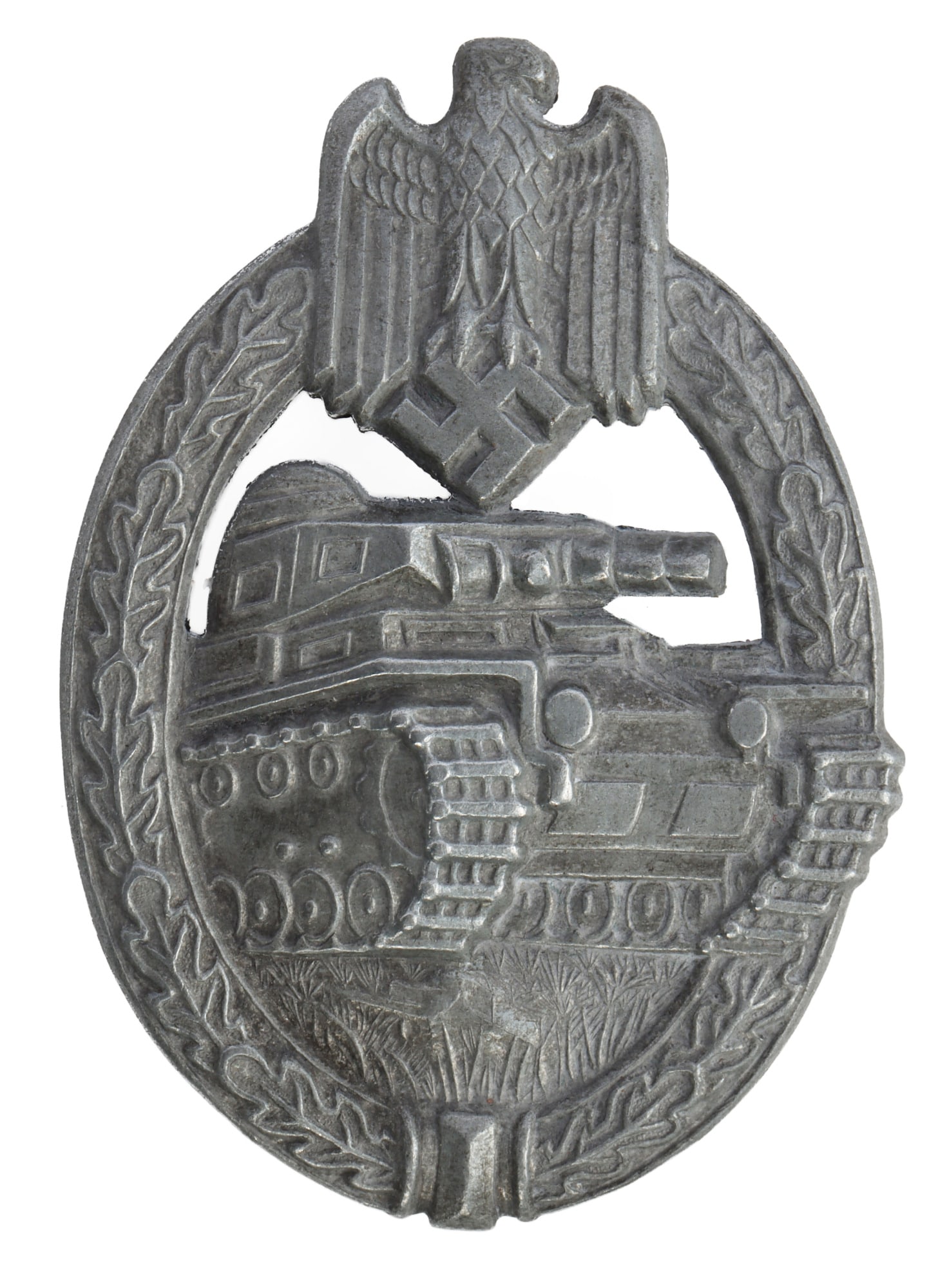 WWII GERMAN PANZER ASSAULT BADGE IN SILVER: Silver grade in zinc construction. Typical panzer design with army eagle and swastika. It measures 2 1/4 inches. Marked HA for Hermann Aurich. This lot has a reserve.
