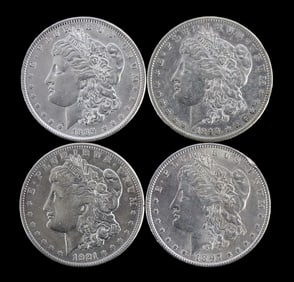 LOT OF 4 MIXED DATE MORGAN SILVER DOLLARS