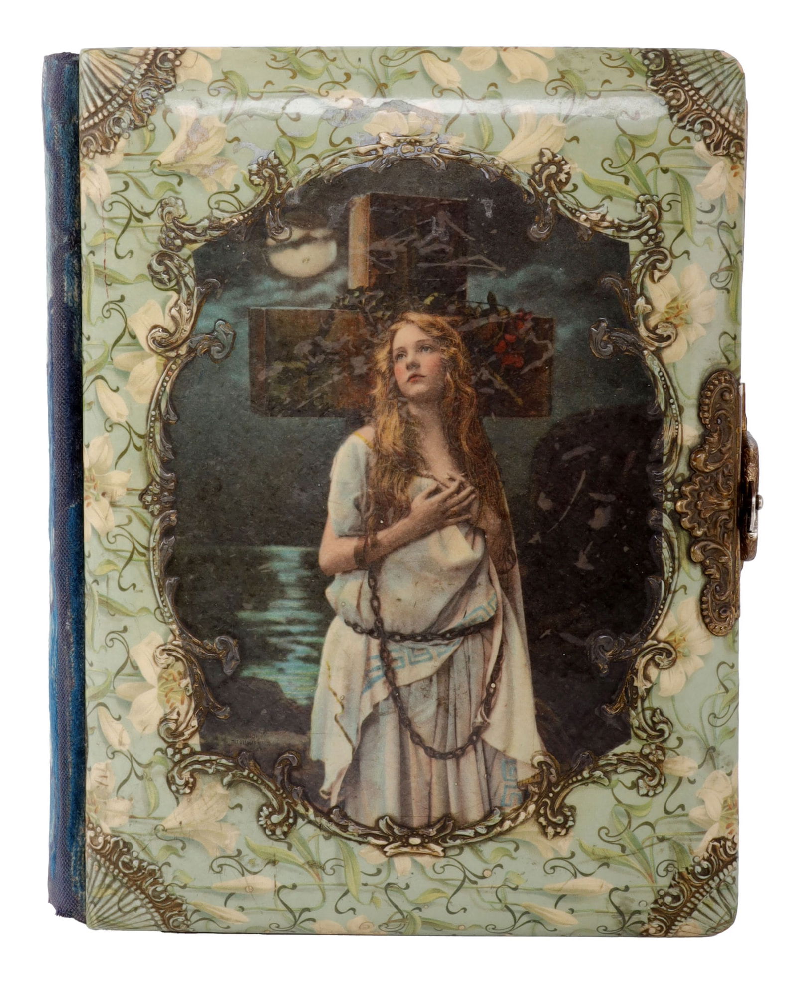VICTORIAN VIRGIN MARTYR CELLULOID PHOTO ALBUM: Ornate Victorian portrait album with celluloid front cover and fabric back cover. Brass latch. Includes 10 cabinet photograph portraits. Dimensions 8.5 x 11 inches. Good condition.