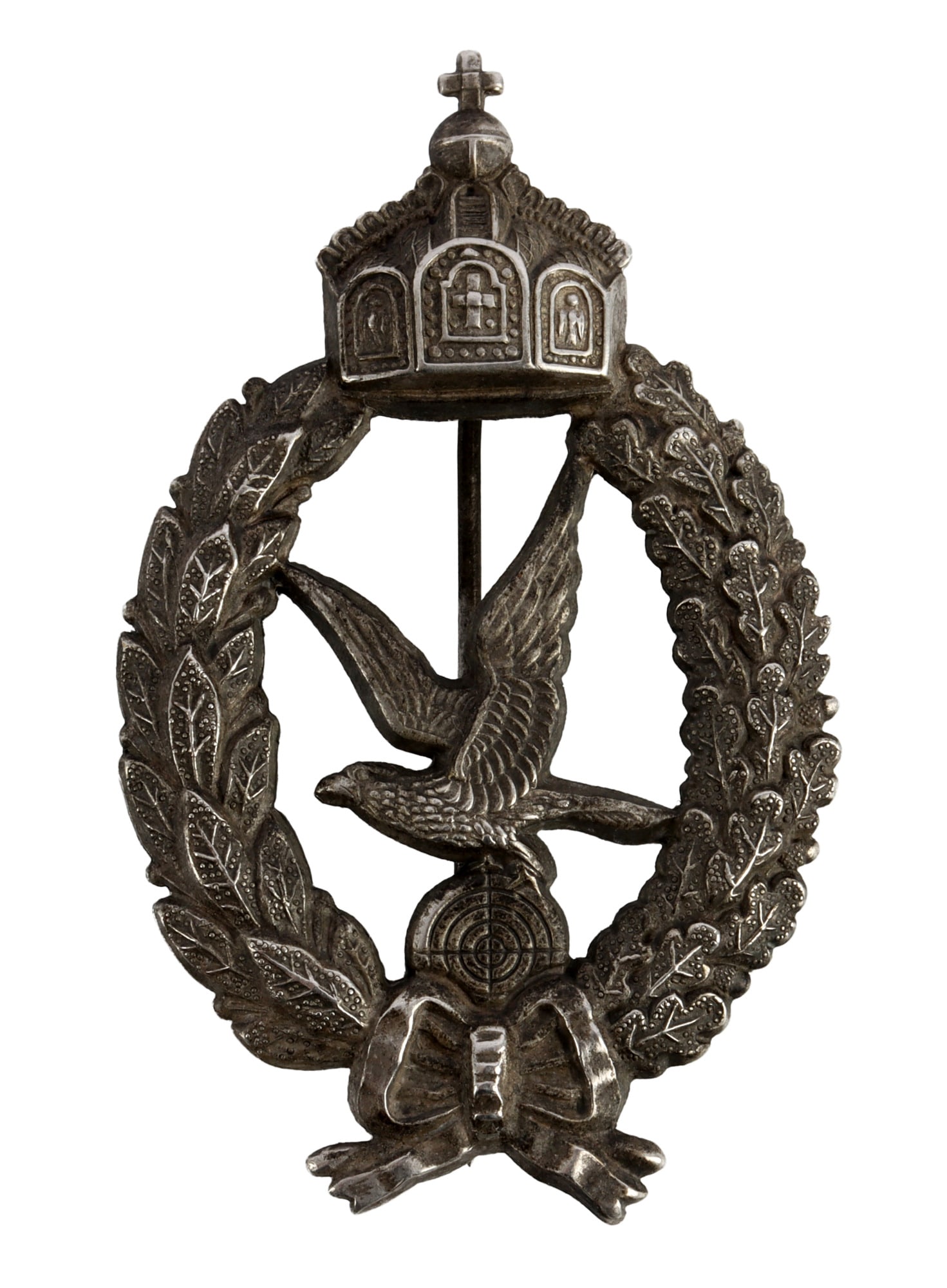WWI IMPERIAL PRUSSIAN GUNNERS BADGE: Stamped out type. Appears to be silver plated with toning but difficult to discern. It measures 2 7/8 inches. Very good condition. This lot has a reserve.