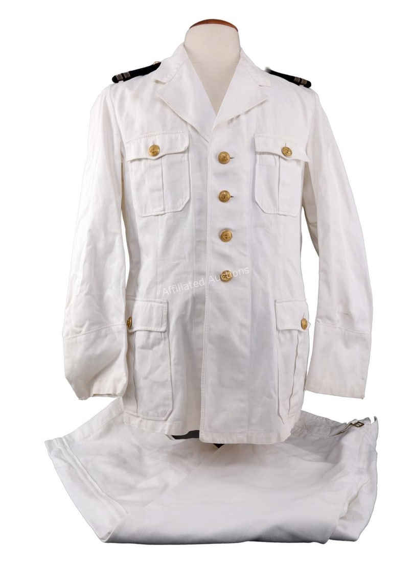 WWII GERMAN KRIESGMARINE SUMMER TUNIC & TROUSERS: Kriegsmarine M29 summer tunic and trousers of light twill. Tunic has WWII US Merchant Marine shoulder boards. Wire loops affixed to button shanks are modern replacements. Trousers interior waistband i